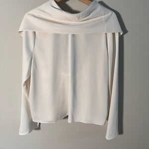 Elegant Cream Blouse with Draped‎ Neckline & Open Back Bow Detail